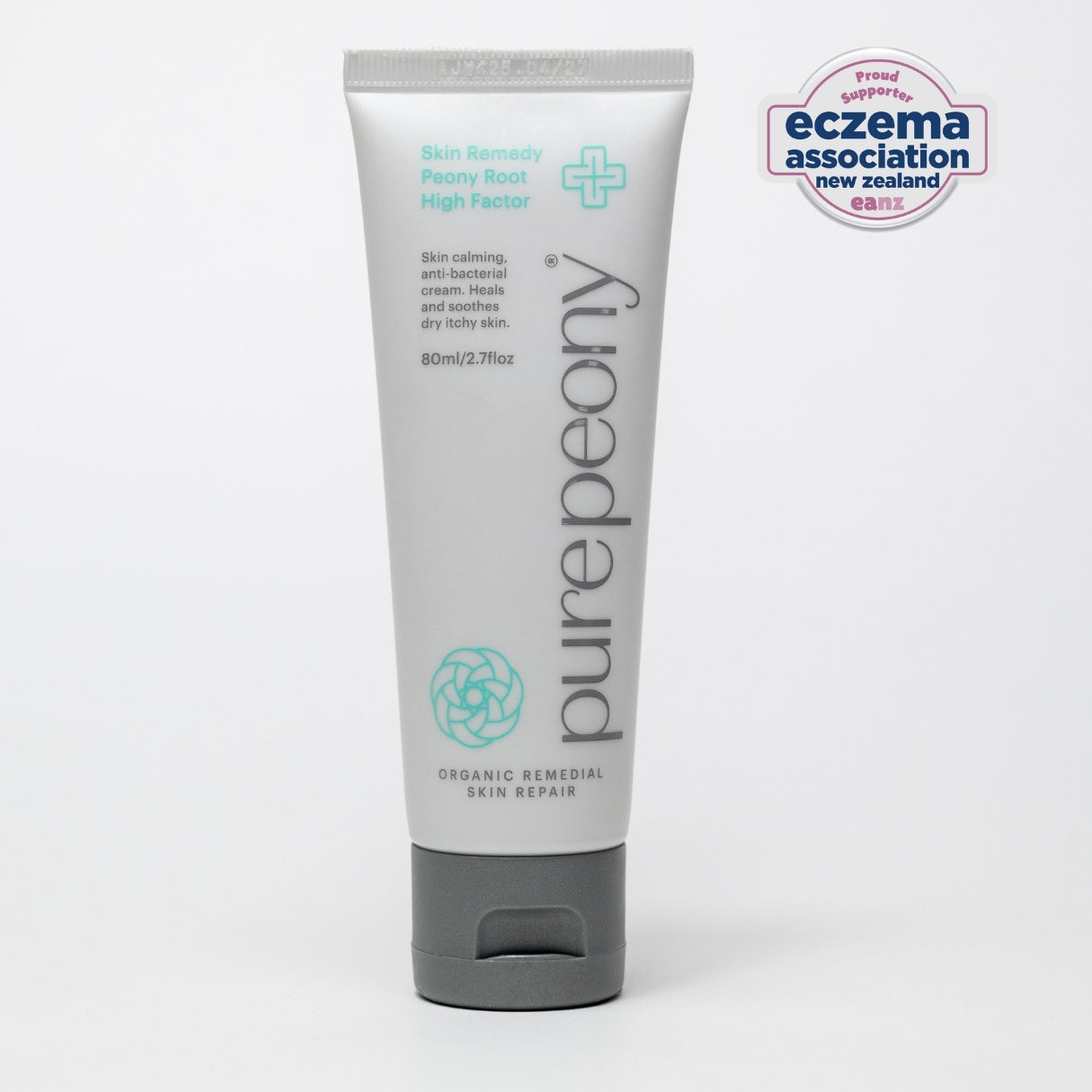 Tube of pure peony skin repair cream on a white background with Eczema Association New Zealand logo.