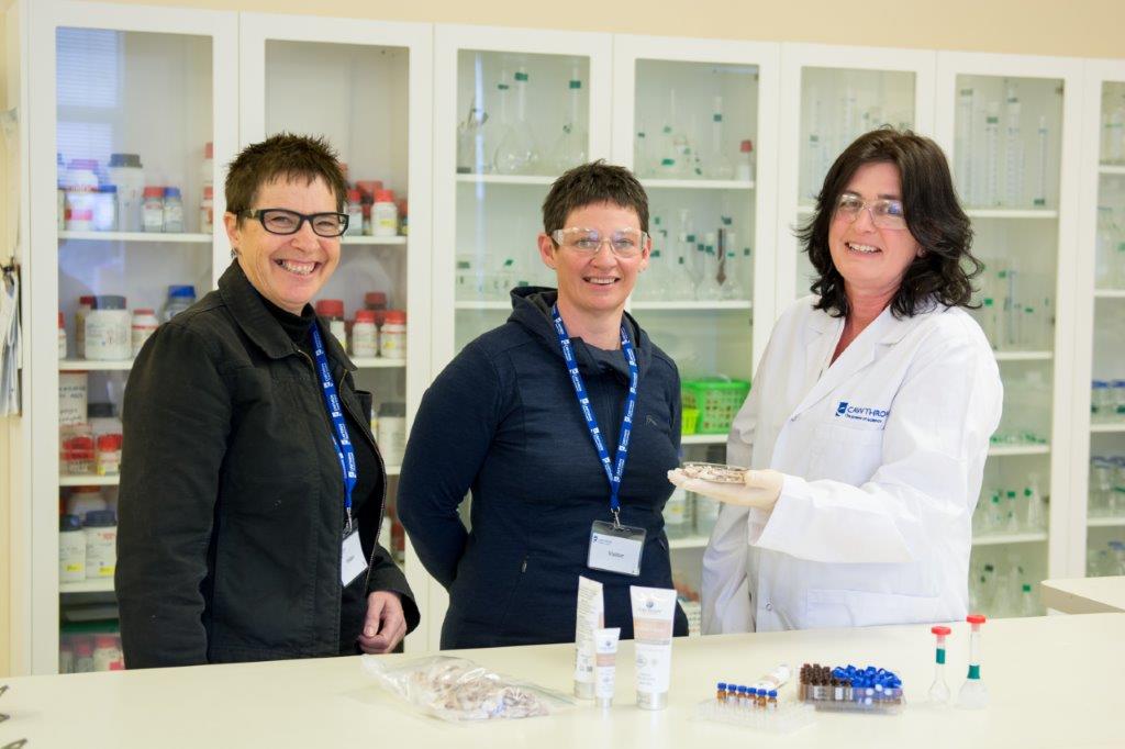 Pure peony founders scientifically testing dove river products in a lab