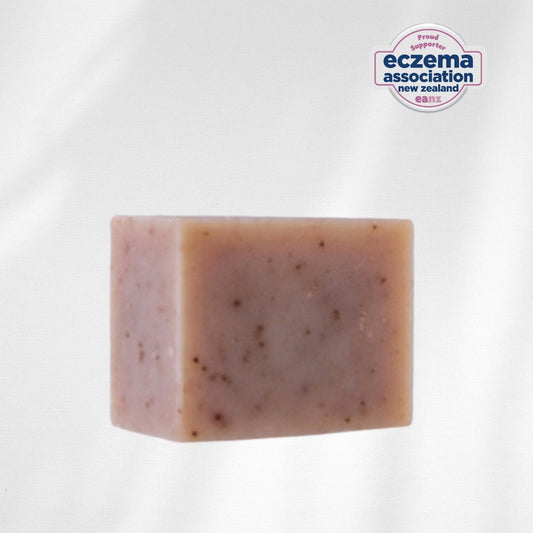 Bar of soap with a visible 'eczema association new zealand' logo on a white background