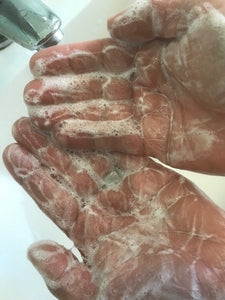 Peony Cleanser lathered up on hands