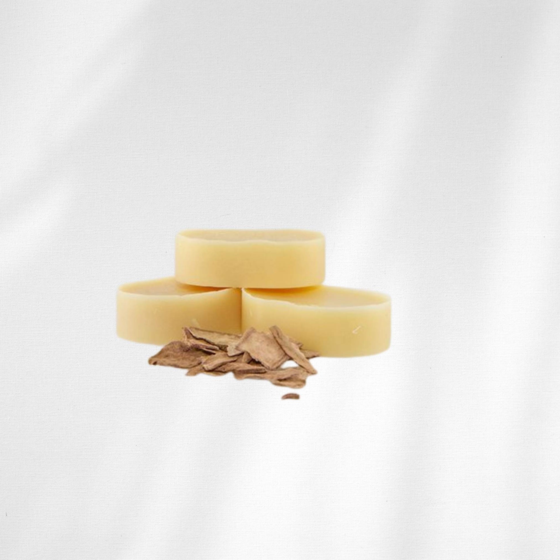 Three hair conditioner bars stacked with the hero ingredient peony root shown