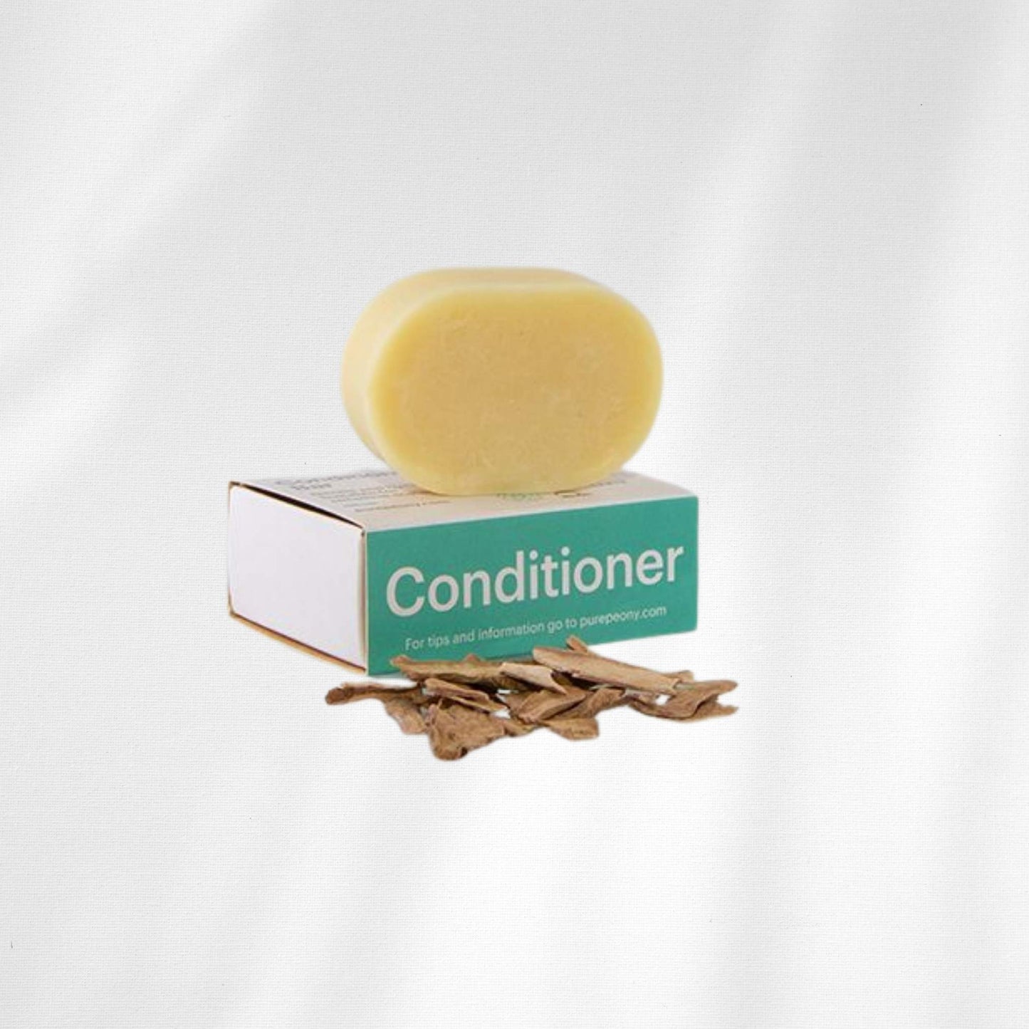Solid natural 'Hair Conditioner' bar packaged sustainably in a box