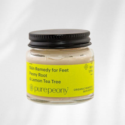 Jar of 'Skin Remedy for Feet' by pure peony on a white background