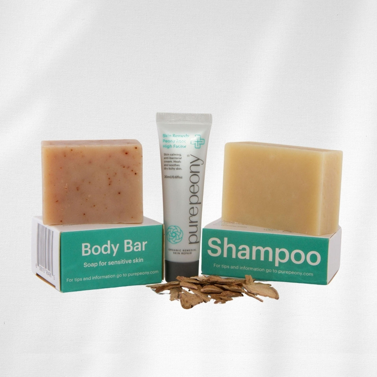 Pure Peony body bar and shampoo with packaging on a white background