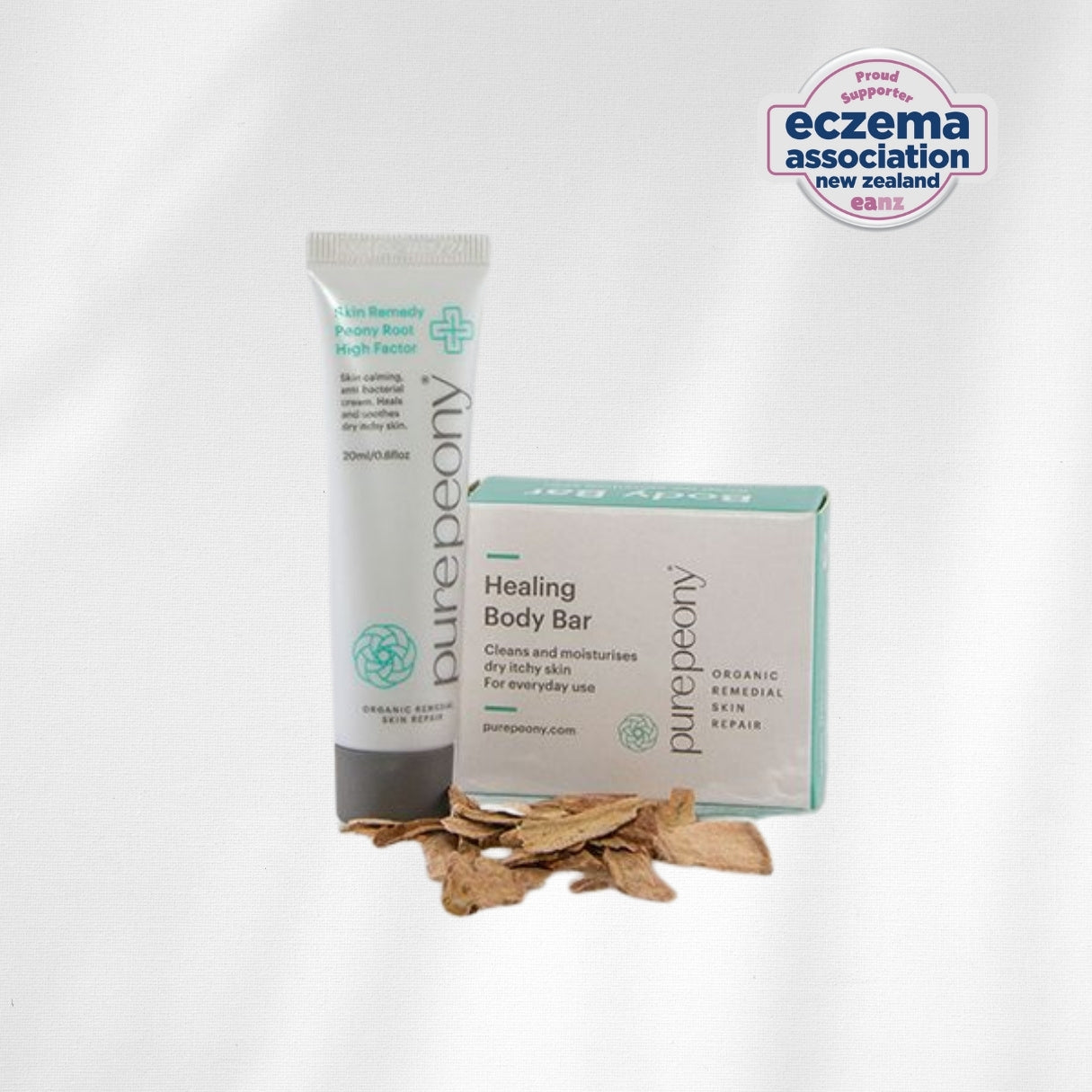 purepeony healing cream and body bar with eczema logo on a white background